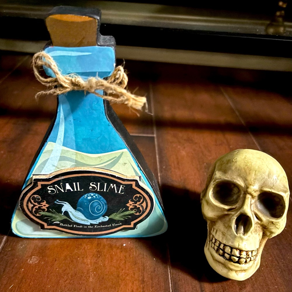 Halloween decor snail slime apothecary skull